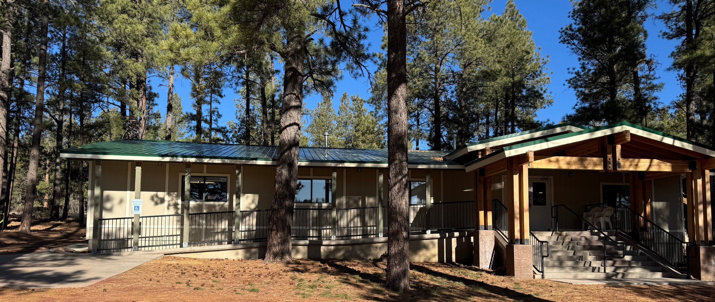 Light On The Mountain Campground building exterior among ponderosa pines