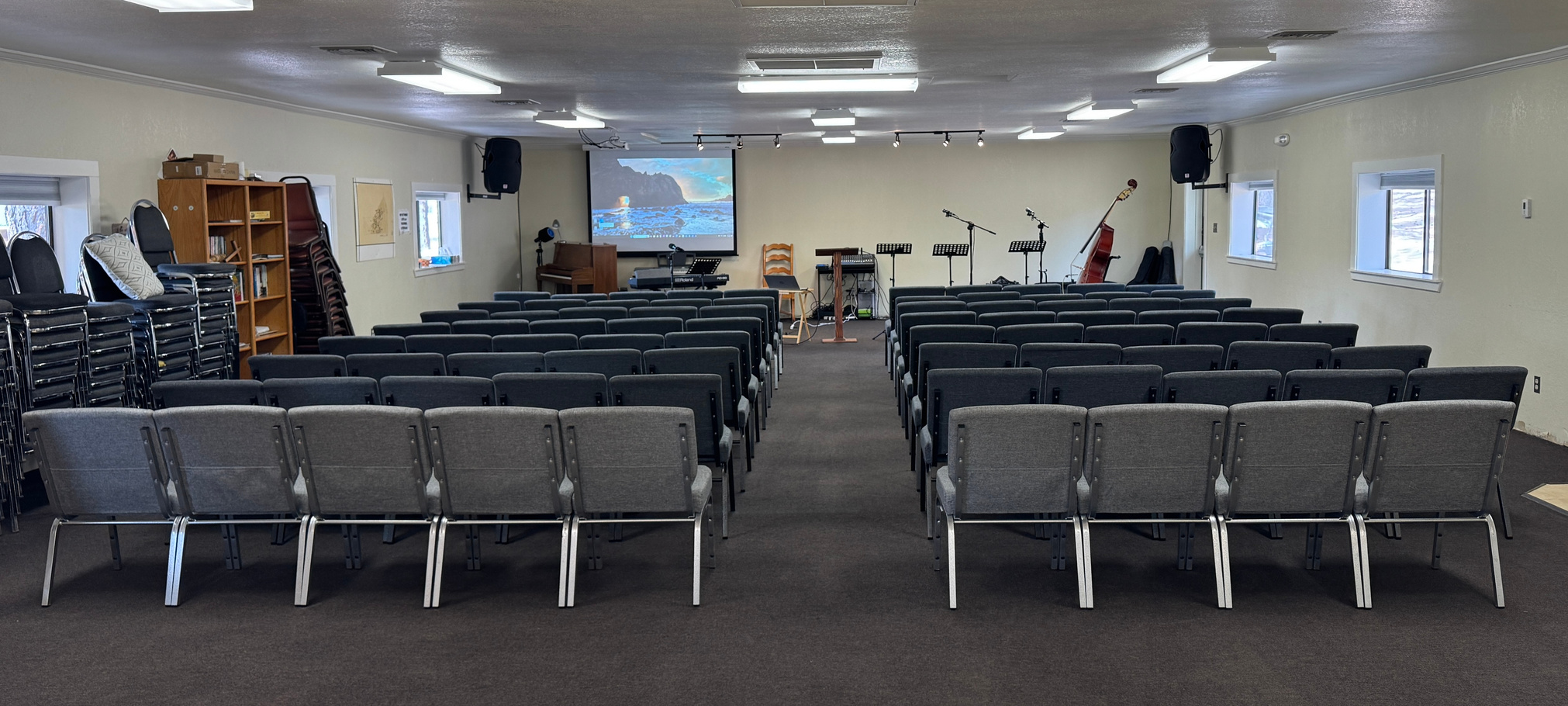 Meeting hall with projection screen and stage